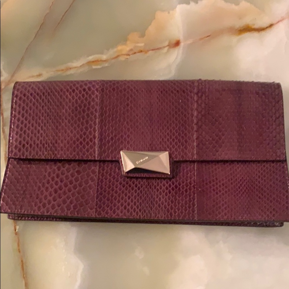 Cesare Paciotti burgundy lizard leather clutch. - Picture 1 of 6